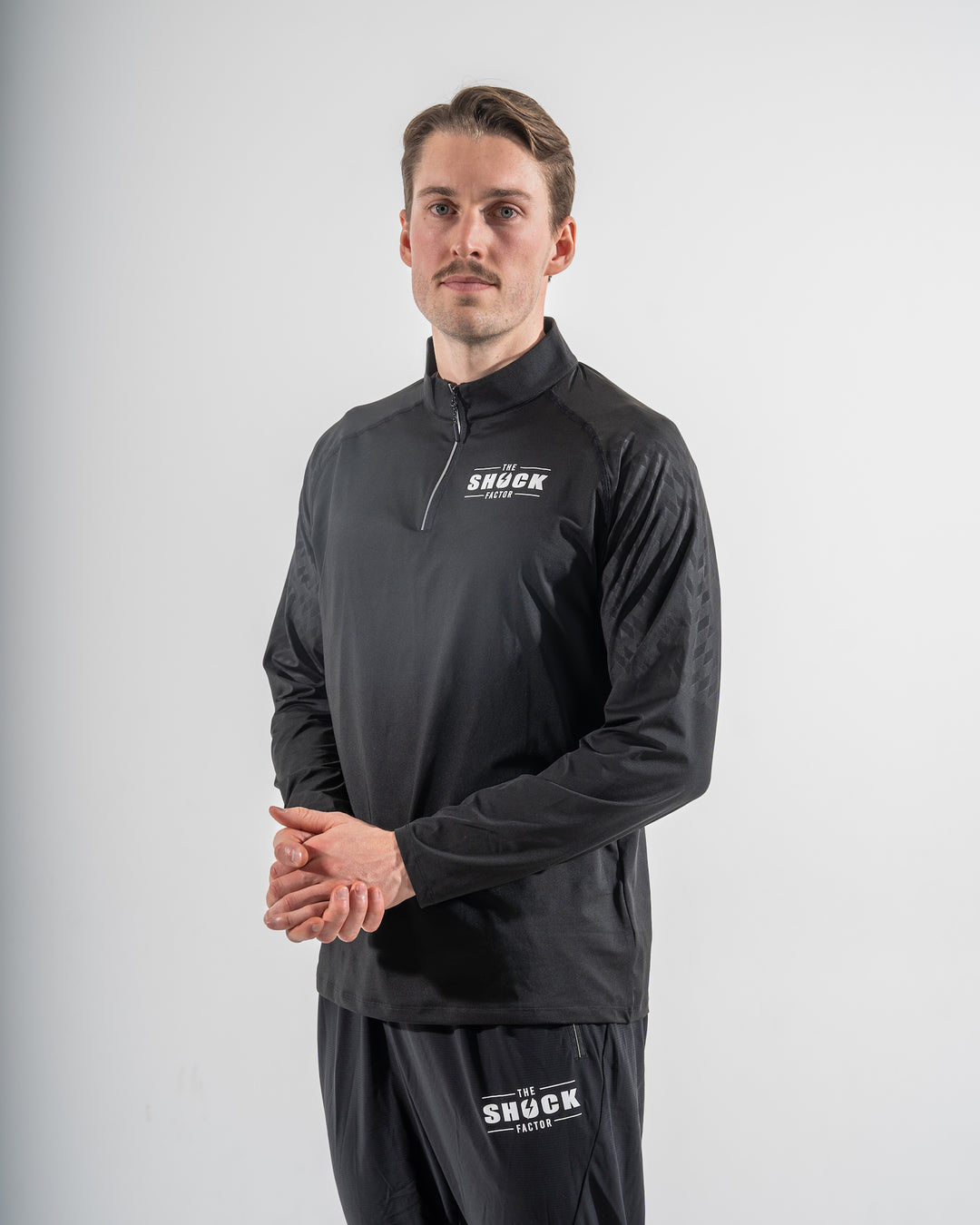 Svart Elite 1/4 Zip Long Sleeve